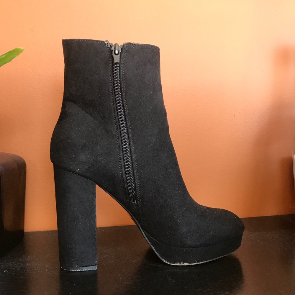 Black platform heeled boots